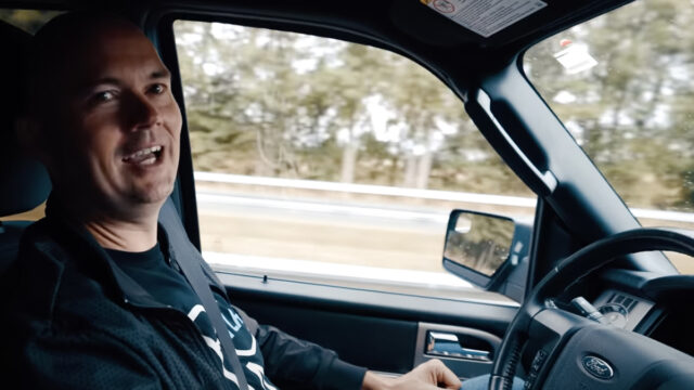 Torben being filmed while driving down the road